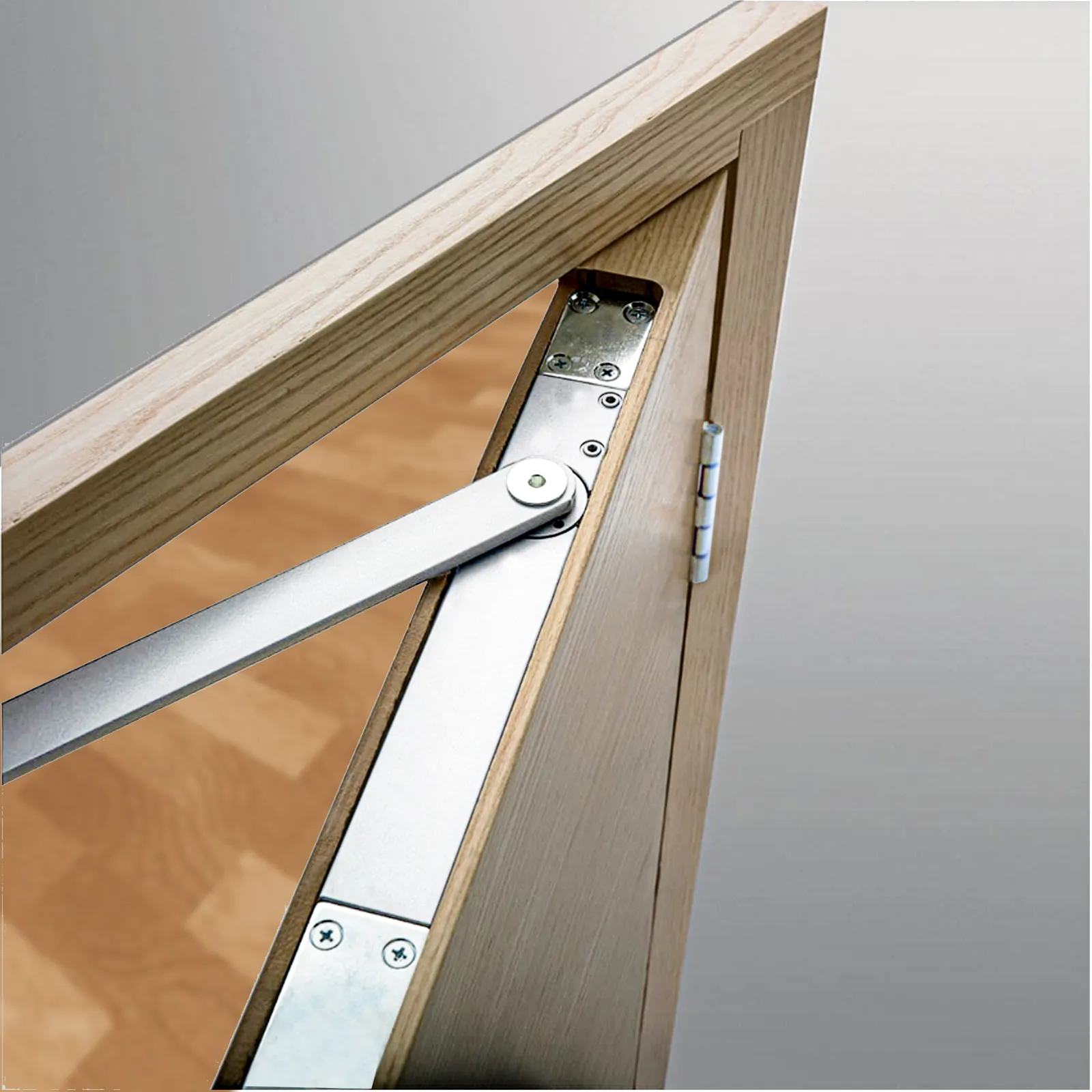 Overhead door closer arm on a timber door